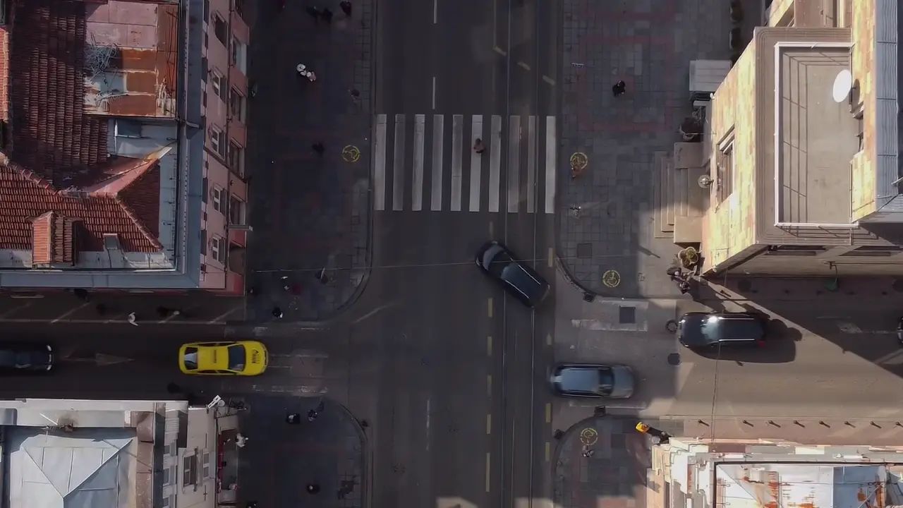 Untouched still from the source aerial footage at frame 100 — no tracking overlay baked in