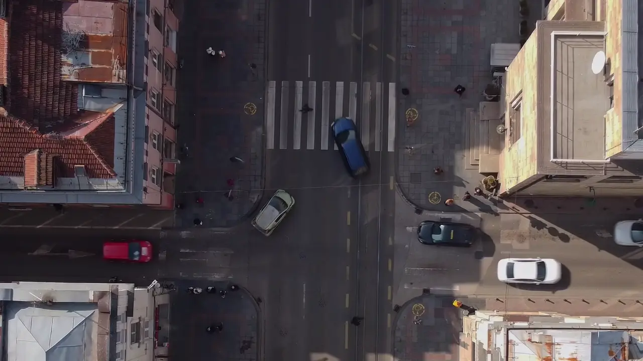 Untouched still from the source aerial footage at frame 280 — no tracking overlay baked in